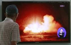 North Korea fires missiles into sea 