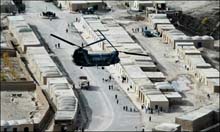 Two killed in Afghan bombing, doctor found dead 