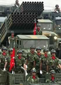 UN Nuclear Inspectors Begin Work in Iran as N. Korea Says It Is Making Nuclear Bombs