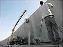 Qurei Calls for Action on Barrier