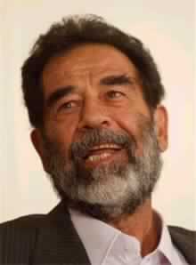 Saddam Defiant in First Court Appearance