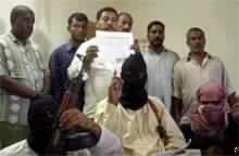 Iraqi Group Threatens to Behead Hostages as Six Iraqis Killed in Blasts